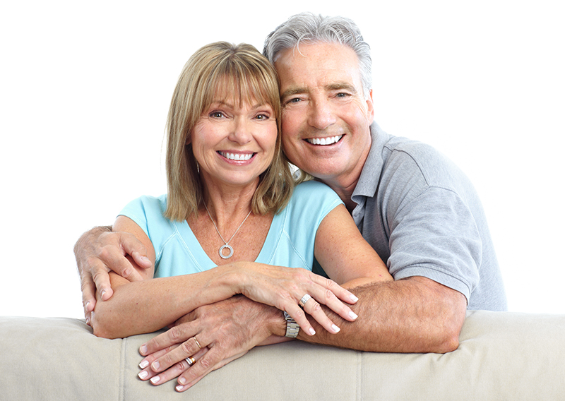 Senior Happy Couple With Dental Implants From Soft Touch Dental Spa